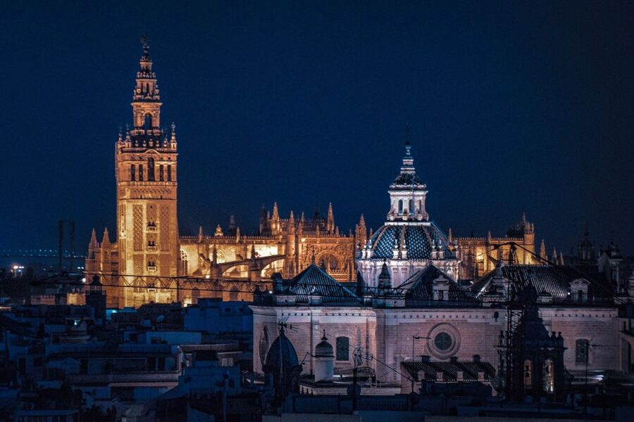 Algarve: Seville Full-Day Shopping and Sightseeing Tour - Triana Bridge arrival, the moment Seville clicks