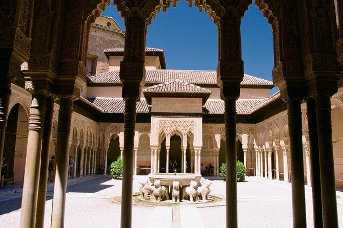 Alhambra &Charles Palace Guided Tour with Optional Nasrid Palaces - Getting there: minivan pickup or meet at the gates