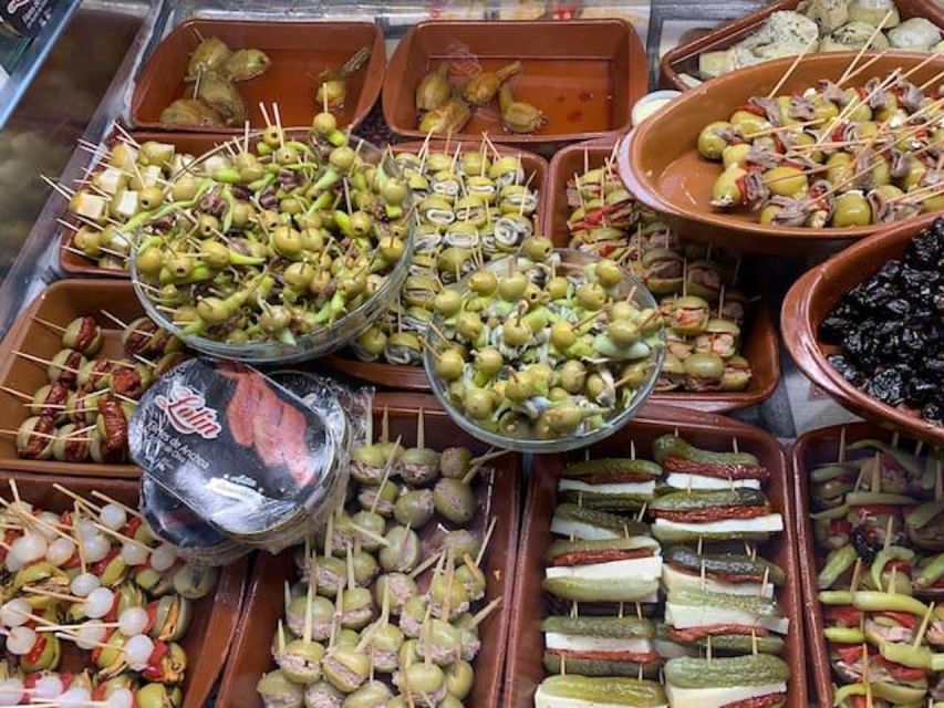 Alicante: Secret Flavors Food Tour - The drinks pairing: beer and wine at the market counter