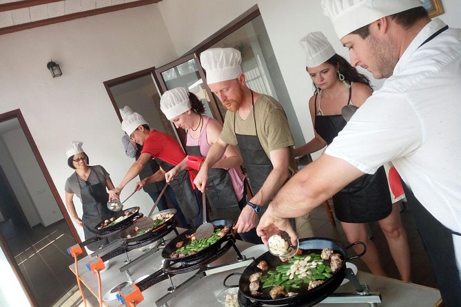 Authentic Valencian Paella Cooking Class - The tapas-and-wine rhythm: sangria, DO wines, and mistela