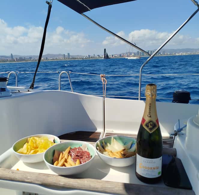 Barcelona Badalona : Sailboat Tour, Snacks, Drinks, Swimming - Swim Break and SUP on a 36-Foot Deck: Fun, but Use Common Sense