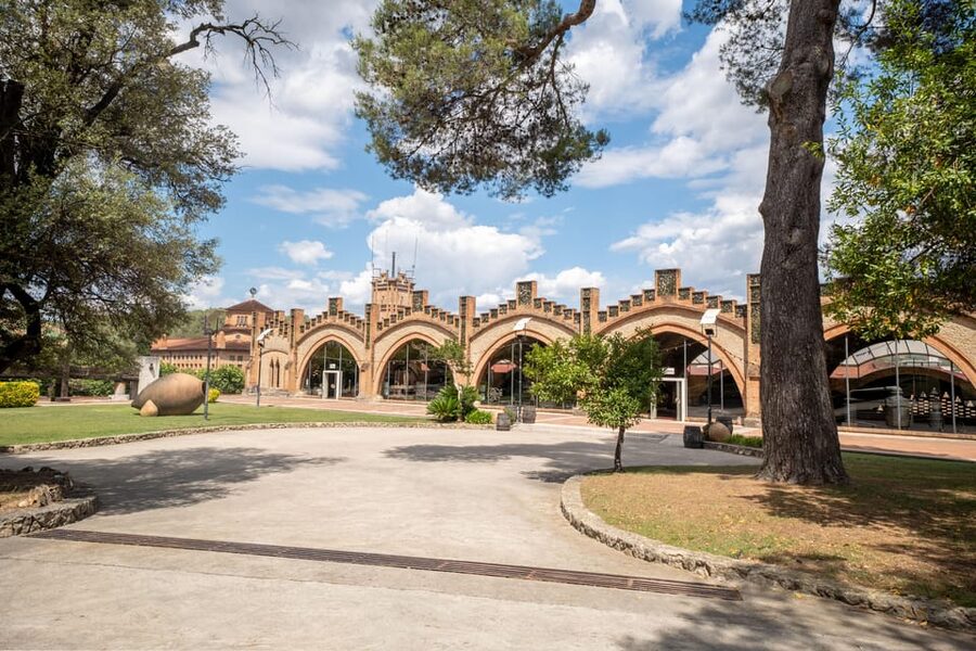 Barcelona: Casa Codorníu Guided Tour with Cava Tastings - The big payoff: descending 20 meters and riding the electric train