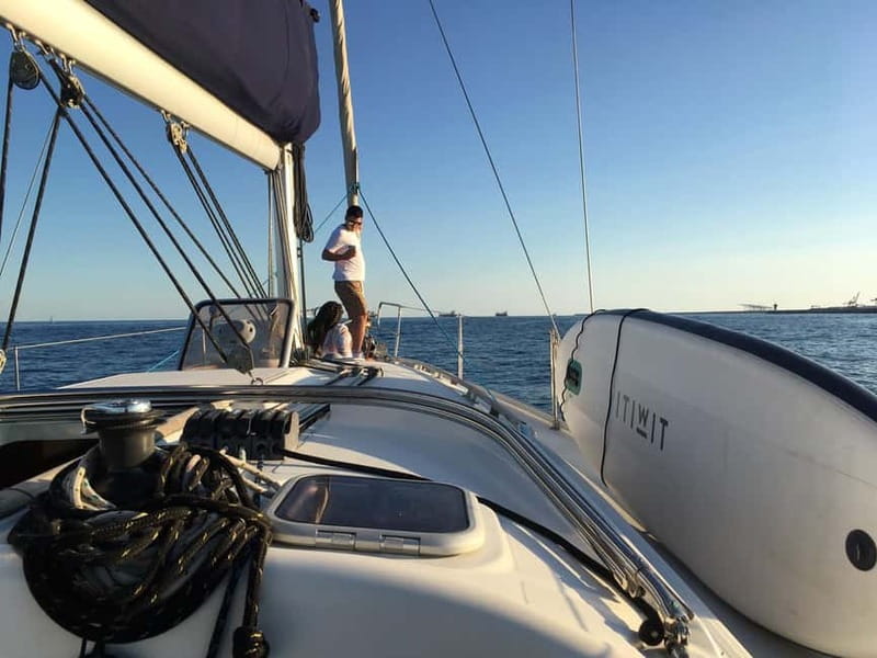 Barcelona: Daytime or Sunset Cruise with Drinks - Vila Olimpica: The Modern Waterfront Side of Barcelona