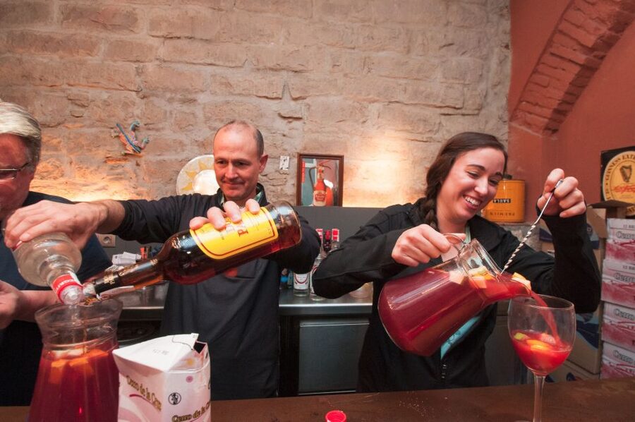 Barcelona: Paella Cooking Experience & Boqueria Market Tour - Tasting and learning tapas: pan con tomate and pintxos