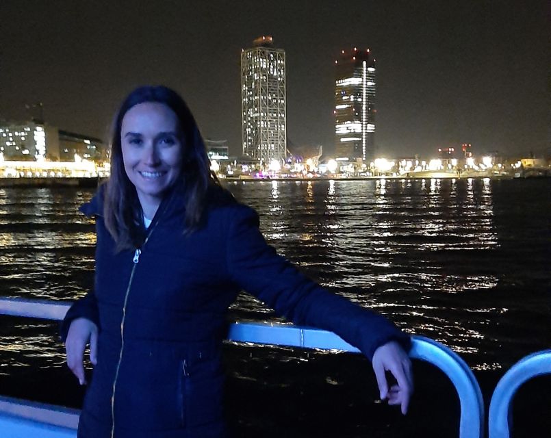 Barcelona: Private Evening Cruise with Dinner and Drinks - City lights from the water, not just behind a window