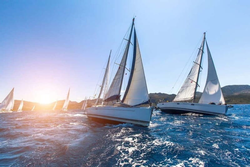 Barcelona: Sailing Tour + Food, Drinks, Swim & Sunset Option - Entering the experience: meeting near Barceloneta or Port Vell