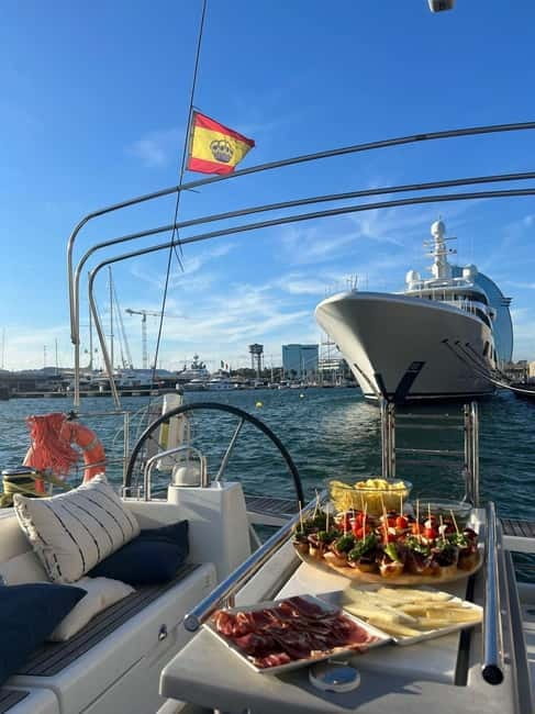 Barcelona: Sailing Tour + Food, Drinks, Swim & Sunset Option - The sailing route: Americas Cup harbor, then cruising past the beach