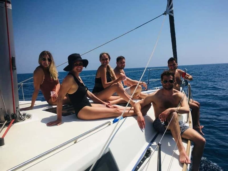 Barcelona: Sailing Tour + Food, Drinks, Swim & Sunset Option - Safety briefing, then straight into the fun