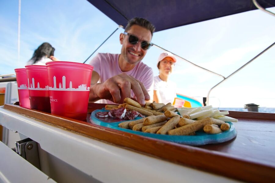 Barcelona: Sailing Tour with Spanish Tapas and Drinks - Sailing out of Port Olímpic, with Barcelona at sea level