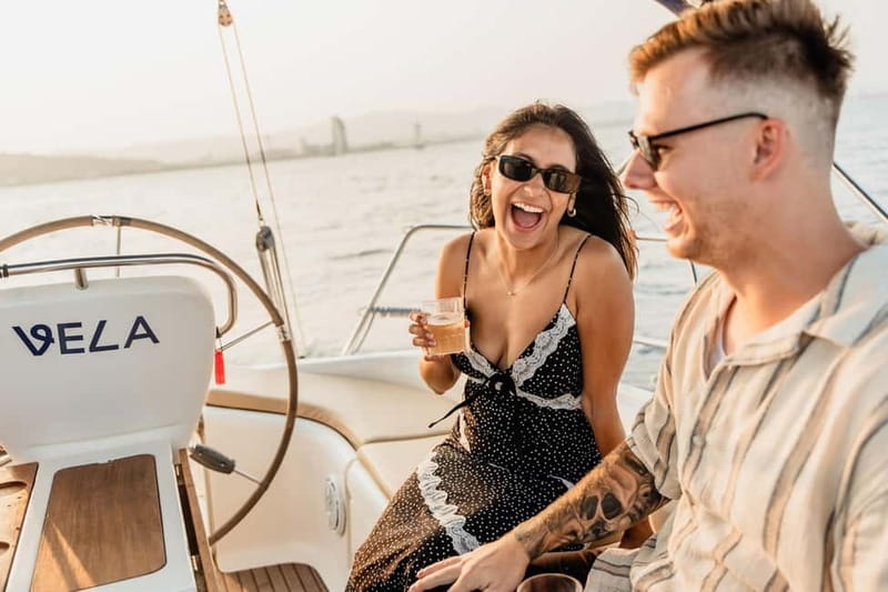 Barcelona: Sailing Tour with Young Local Captain & Drinks - The viewpoint stop: drinks, Polaroid time, and a swim in Mediterranean water