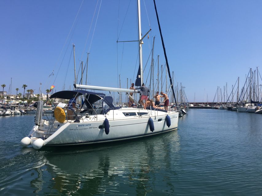 Barcelona: Sunset Boat Trip with Cava Wine and Snacks - Practical tips for a smoother sail from Port Olimpic