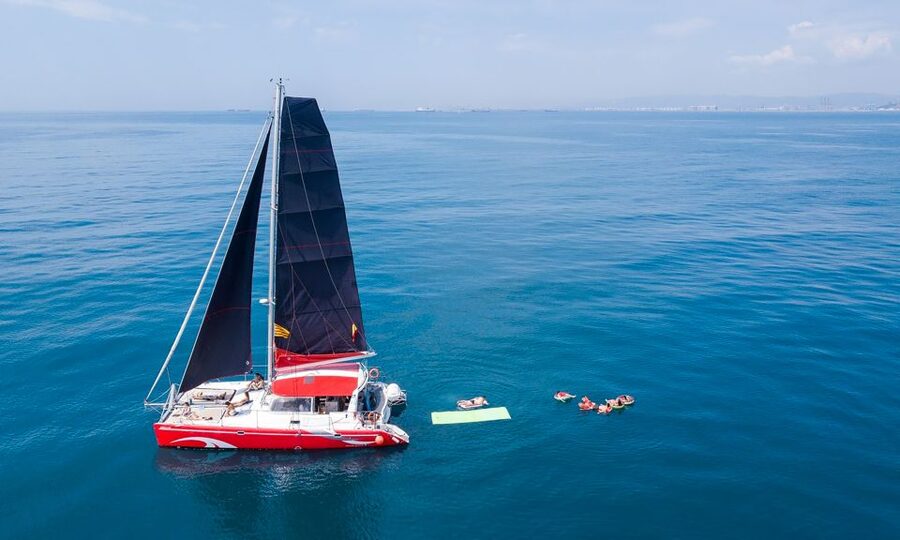 Barcelona: Sunset or Day Catamaran Cruise with Tapa & Drink - Marina Vela catamaran timing that works with a tight Barcelona schedule