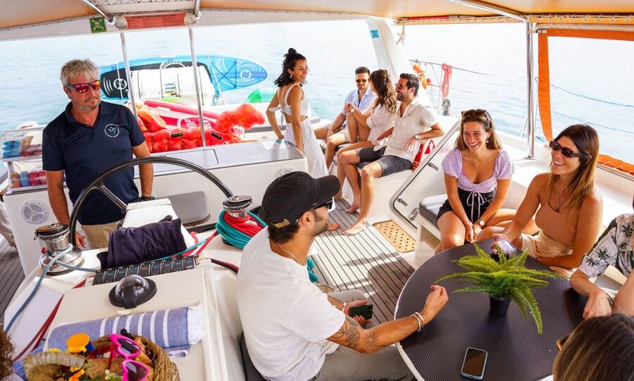 Barcelona: Sunset or Day Catamaran Cruise with Tapa & Drink - What the crew actually does: friendly, attentive, and safety-minded