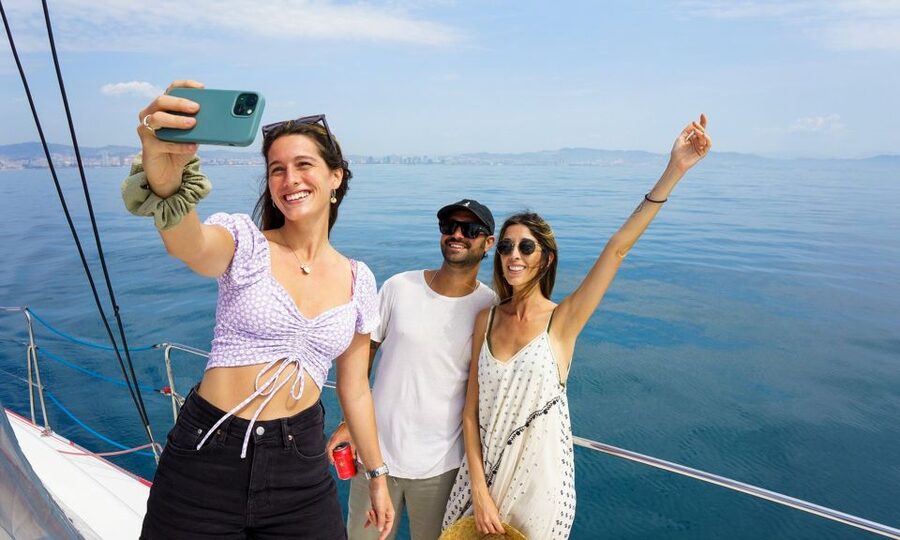 Barcelona: Sunset or Day Catamaran Cruise with Tapa & Drink - Boarding and first sip: what you get before the skyline show