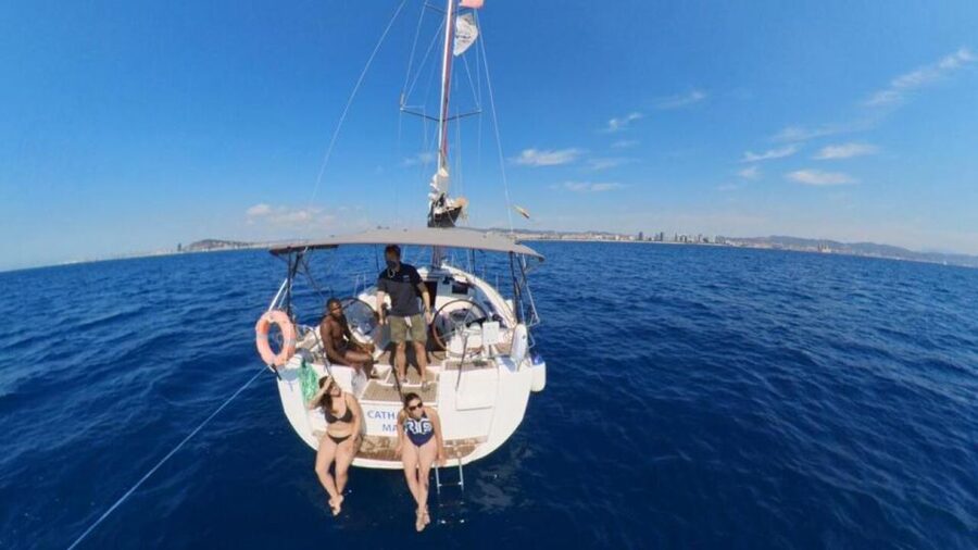 Barcelona: Sunset Sailing Experience with Snacks and Cava - The water break: jump, paddle board, or float