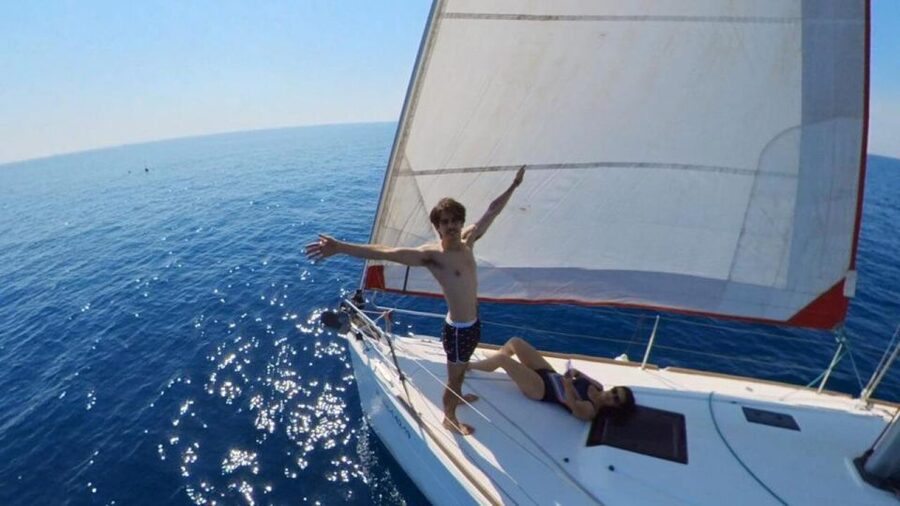Barcelona: Sunset Sailing Experience with Snacks and Cava - What to bring: sunglasses, sunscreen, and a winter jacket