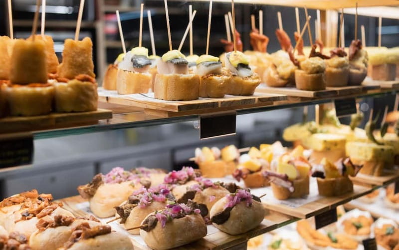 Barcelona: The Ultimate Local Tapas & Drinks Food Tour - Sweet finish: Catalan cream in cooler months, ice cream in summer evenings