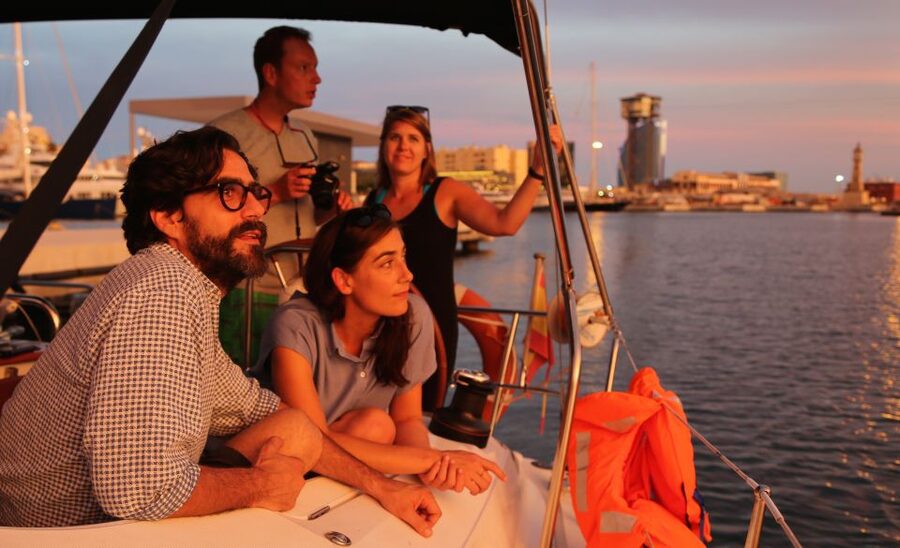 Barcelona: Unique Sunset Sailing Tour with Tapas & Open Bar - Boarding, the skipper, and the chance to steer