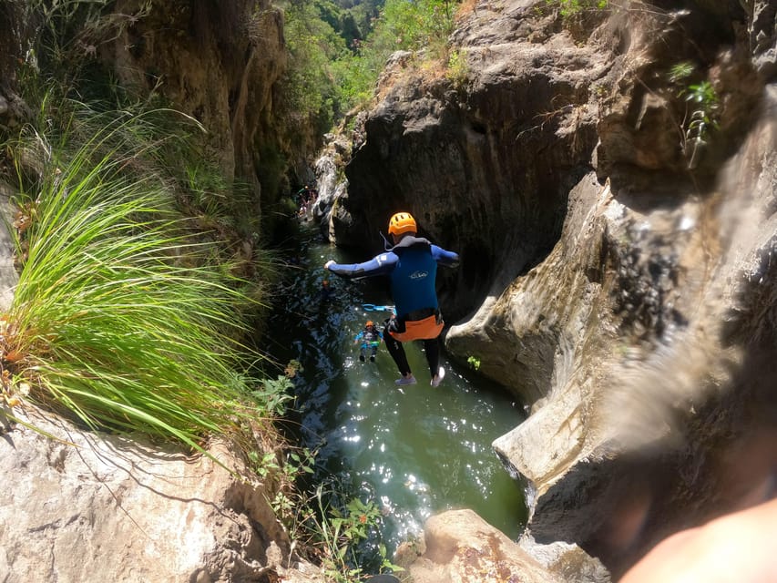 Benahavís: Canyoning Guided Tour at Guadalmina River - What snacks, drinks, and included media do for your trip