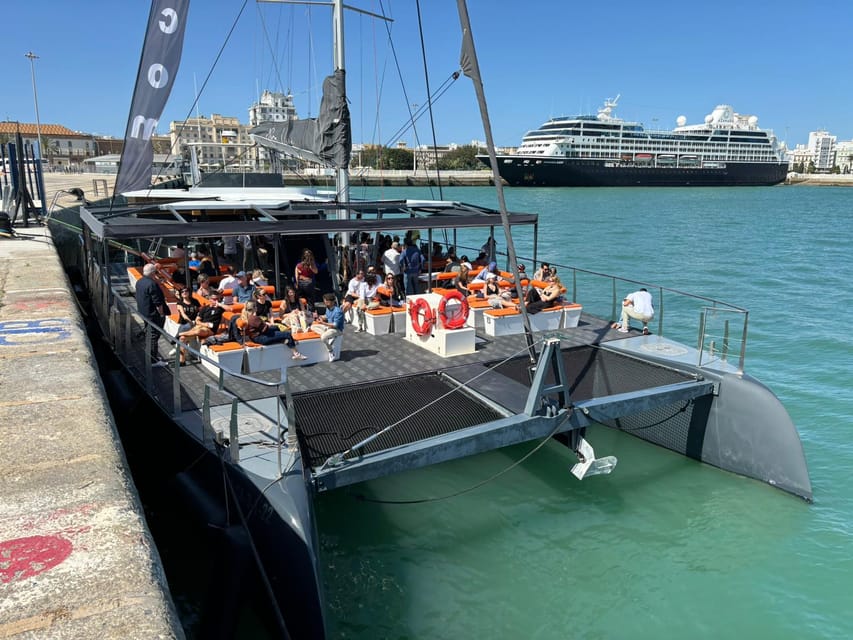 Cádiz: Sunset Catamaran Cruise Tours - The onboard experience: audio guide, bathrooms, and crew