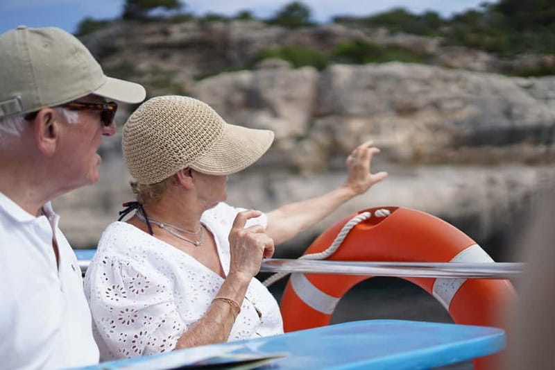 Cala'n Bosc: 3.5-Hour South Coast Sightseeing Boat Trip - Waterslides and the Reflex Glass-Bottom System