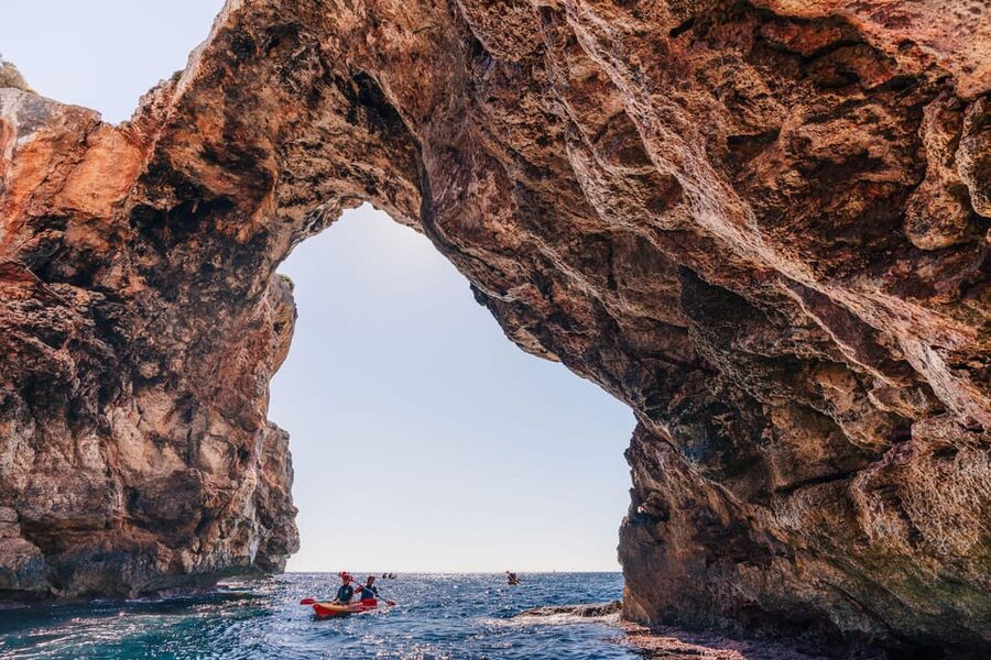 Cala Varques: Guided Sea Caves Kayak & Snorkeling Expedition - Kayaking route and hidden cave focus: Cova des Coloms, Falco cave, pirate caves, and arches