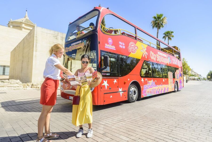 Córdoba: City Sightseeing Hop-On Hop-Off Bus Tour - The 6pm Judería Walking Tour from Puente Romano