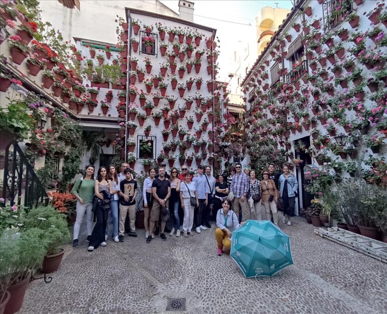Cordoba: Courtyards Festival Guided Tour in Spanish - Walking Through Three Neighborhoods: San Pedro, San Lorenzo, San Andrés