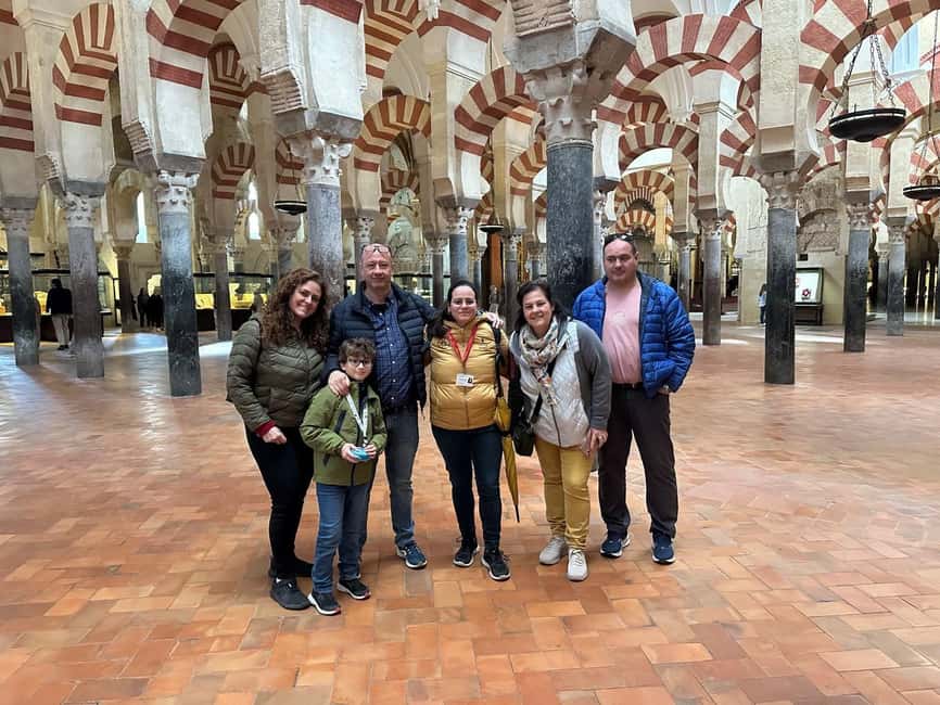 CÓRDOBA: Guided tour of the Mosque-Cathedral IN SPANISH WITH TICKETS - Finding the tour start at Deans’ Gate (and the yellow umbrella)