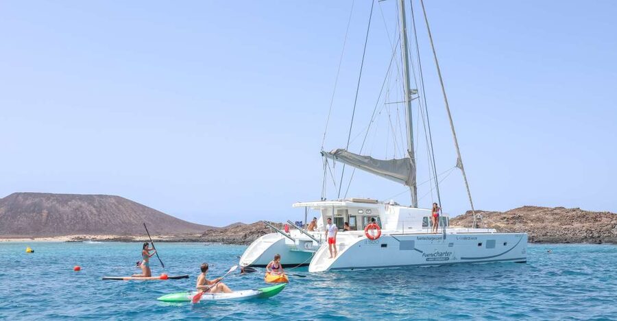 Corralejo: Adults-Only Catamaran Day Trip to Lobos Island - Sailing past La Caldera and the volcanic cone before you swim