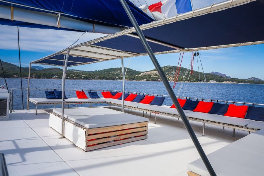 Denia: Cova Tallada Catamaran Tour and Swimming Stop - The Mood on Board: Friendly Crew, Quick Pace