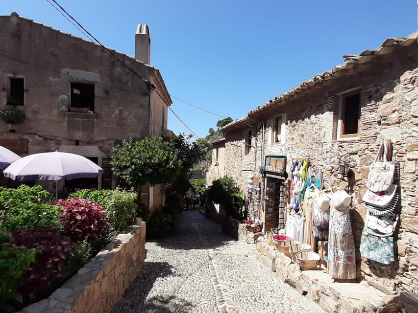 From Barcelona: Tossa de Mar Day Tour with Beach Time - The Guided Old Town Walk: Fortress Walls to Lighthouse Views