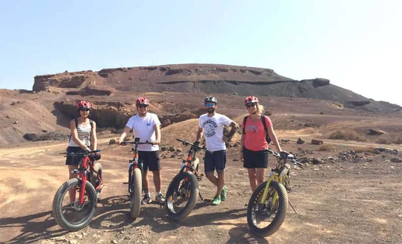 From Corralejo: Fuerteventura Guided E-Bike/E-scooter Tour - Return Ride Along the Ocean, With a Stop at Pop Corn Beach