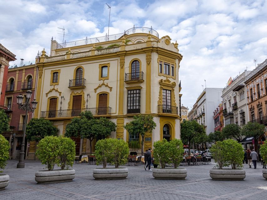 From Costa del Sol: Seville Day Trip - María Luisa Park and Plaza España: where Seville looks like a movie set