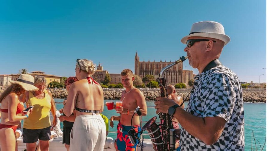 From Magaluf: Palma Bay Sightseeing Cruise with Live Music - Lunch Buffet on Board: Spanish Omelette, Serrano Ham, and Fruit
