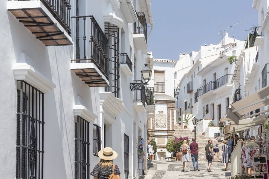 From Malaga: Nerja and Frigiliana Tour - Transportation Comfort: Air-Conditioned Bus, Cobblestones, and Group Flow