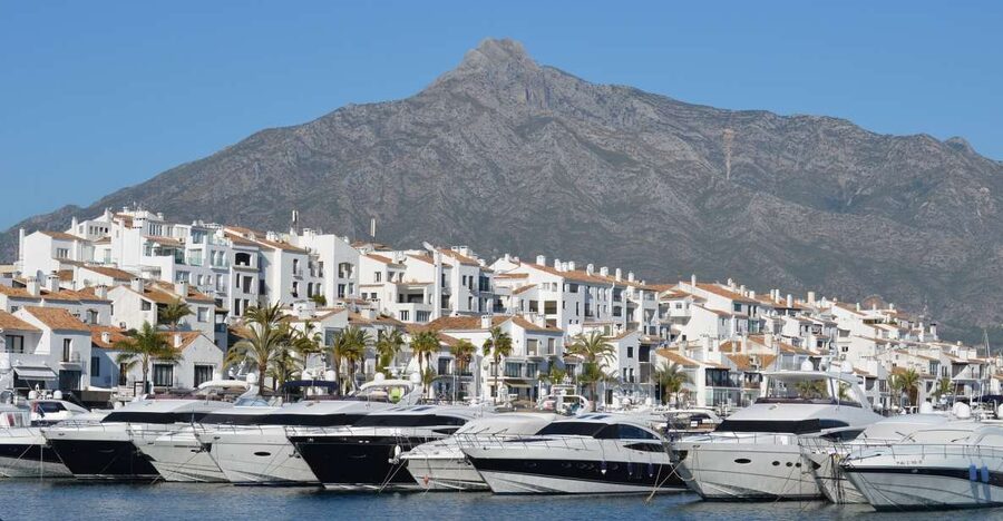 From Malaga or Costa del Sol: Mijas, Marbella & Puerto Banus - Marbella time and Plaza de Los Naranjos, the town’s social center