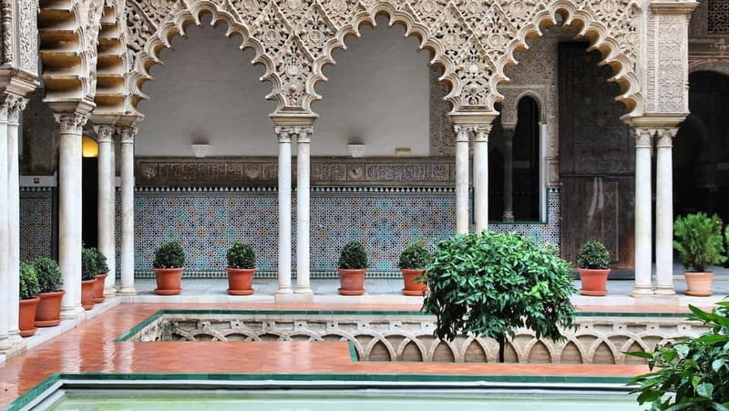 From Malaga: Seville Day Trip with Real Alcázar Tickets - Santa Cruz at your own pace, starting from Puerta de Jerez