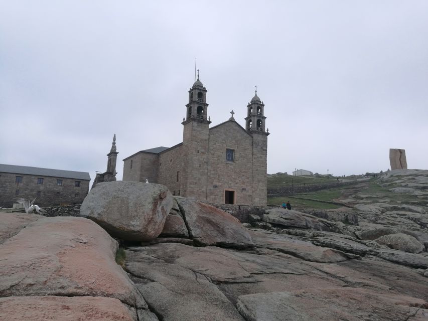 From Santiago: Tour To Finisterre, Muxia & Costa da Morte - Finisterre town: harbor walking and the best kind of lunch break