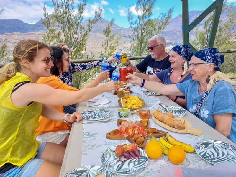 Gran Canaria: Red Gorge, Cave, Oasis Adventure Tour & Picnic - Santa Lucía de Tirajana: coffee break, fruit tasting, and the tapas picnic setup