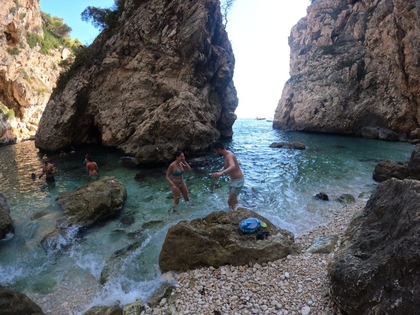 Granadella: Caló, Cova Llop Marí, and Ambolo Kayak Trip - Who this kayaking and snorkeling trip suits best