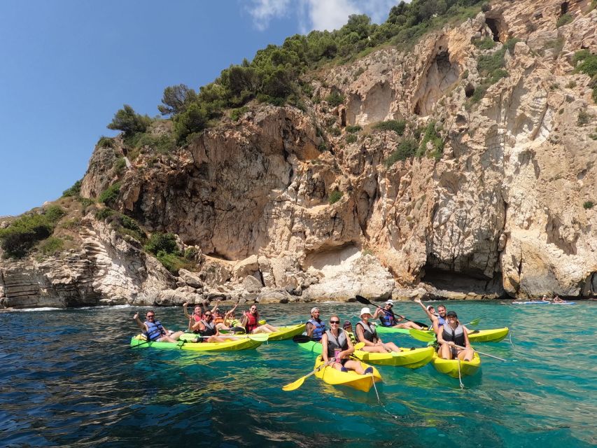 Granadella: Caló, Cova Llop Marí, and Ambolo Kayak Trip - Snorkeling in crystal-clear coves, with real time under the surface
