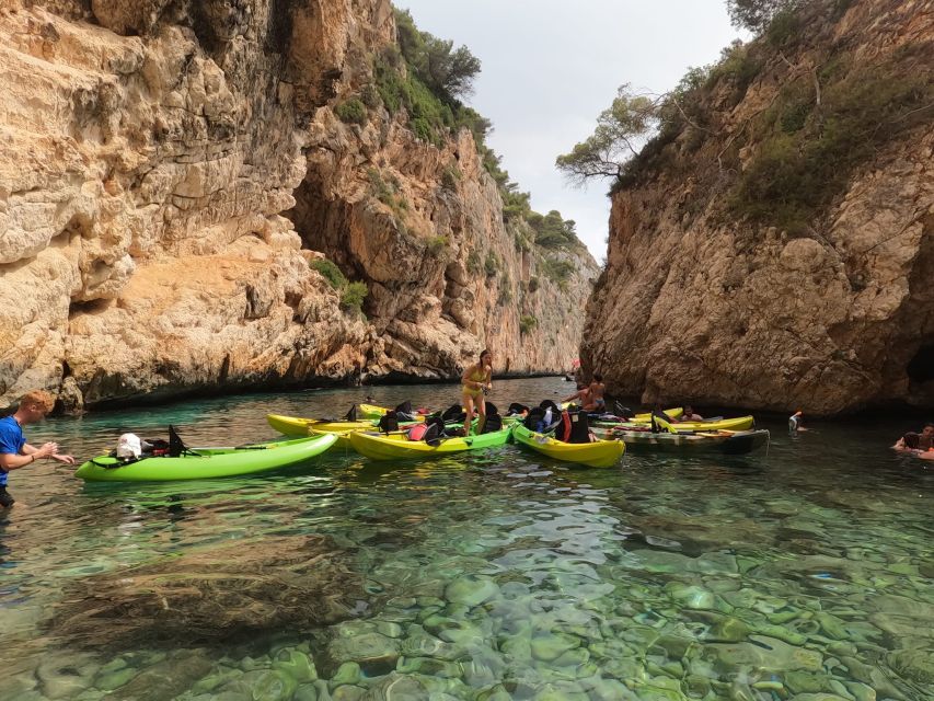 Granadella: Caló, Cova Llop Marí, and Ambolo Kayak Trip - Logistics that matter in Granadella: parking, sea conditions, and comfort
