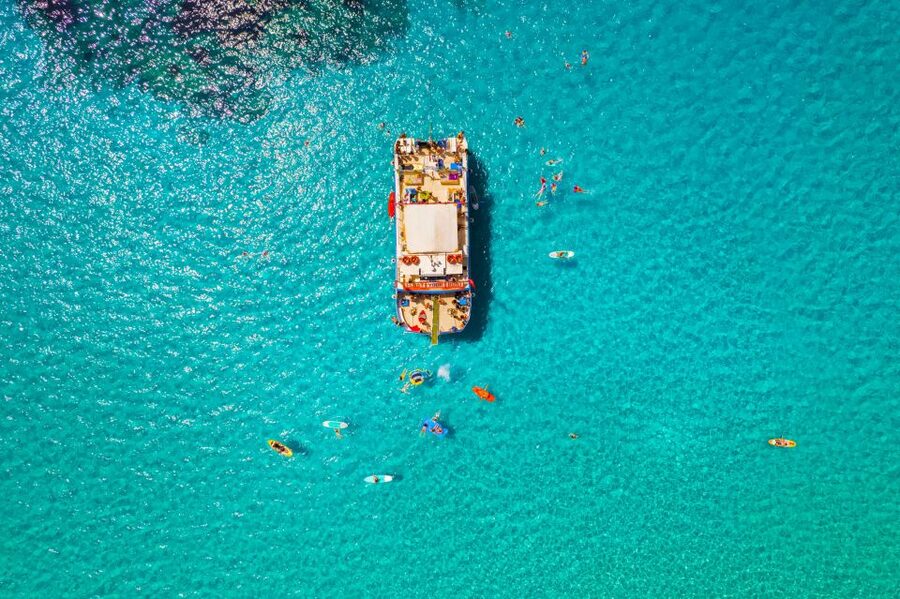 Ibiza: Beach Hopping Cruise w/ Paddleboard, Food, & Drinks - Cala Bassa and Cala Conta: The Two Big Beach Docks