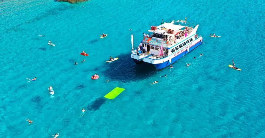 Ibiza: Beach Hopping Cruise w/ Paddleboard, Food, & Drinks - Watching Ibiza Highlights From the Water