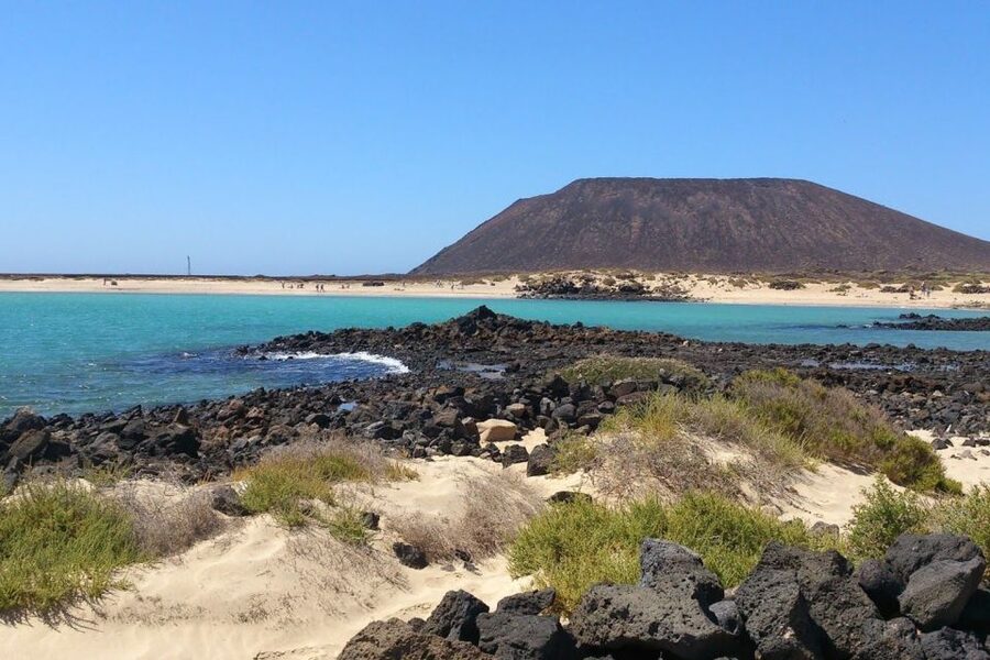 Lanzarote: Lobos Island Half-Day Dolphin Watching Trip - What to Bring: Water Shoes, Sun Protection, and Beach-Ready Comfort