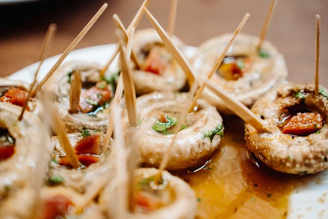 Madrid Tapas & Taverns Small Group Food & History Tour - Where you meet, what you wear, and how the walking actually feels