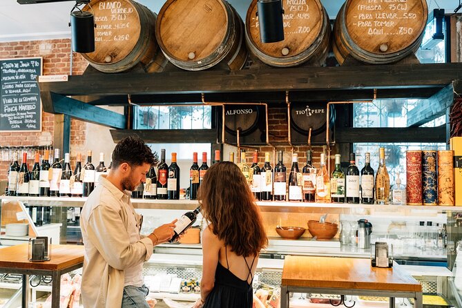 Madrid Tapas & Wine Tour with Rooftop Views and Local Guide - Where the walk starts: Plaza de San Miguel and the tapeo energy