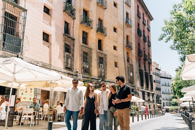 Madrid Tapas & Wine Tour with Rooftop Views and Local Guide - Rooftop views and cava at Gran Vía: the skyline payoff