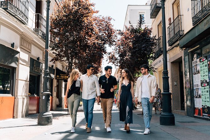 Madrid Tapas & Wine Tour with Rooftop Views and Local Guide - Plaza Mayor meets ham and wine: a classic square with a food purpose